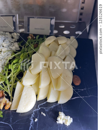 Close up photo of refrigerated Bobby Bell cheese in a restaurant 128126619