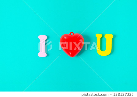 I Love You Concept Banner. Letters on color background with Red heart . 128127325