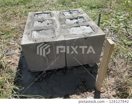 Foundation made of concrete cinder blocks Foundation made of concrete cinder blocks 128127842