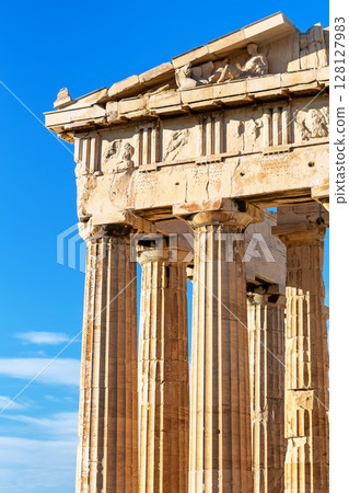 Ancient columns of the Parthenon on the Acropolis, Athens, Greece. Vertical photo 128127983