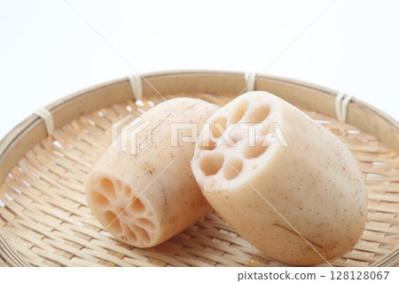 Cross section of lotus root on a bamboo basket Cross section of lotus root on a bamboo basket 128128067