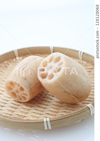 Cross section of lotus root on a bamboo basket 128128068