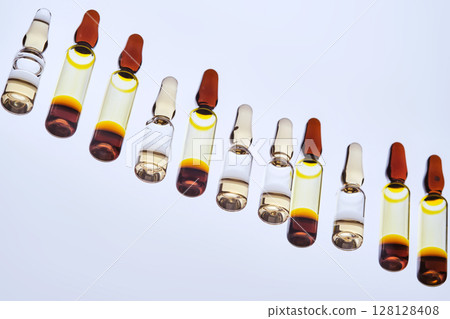 Beautiful background with different ampoules. Beautiful background with different ampoules. 128128408