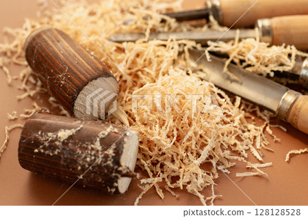 Workshop with tools on brown background 128128528