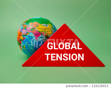 Red triangle with the word GLOBAL TENSION on a globe background. 128128913