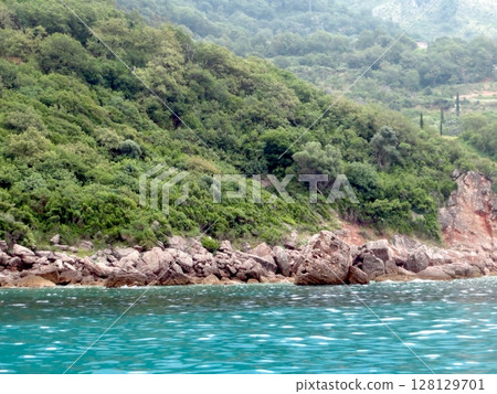 Rocky Coastline and Clear Turquoise Waters of the Adriatic Sea in Montenegro During Summer Rocky Coastline and Clear Turquoise Waters of the Adriatic Sea in Montenegro During Summer 128129701