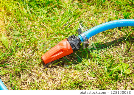 Blue plastic sprayer for gardening Blue plastic sprayer for gardening 128130088