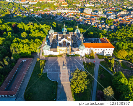 Holy Mountain in Pribram showcases an impressive Baroque complex, surrounded by lush greenery. Visitors find tranquility and spiritual reflection in this historic pilgrimage site in Czechia. 128130597