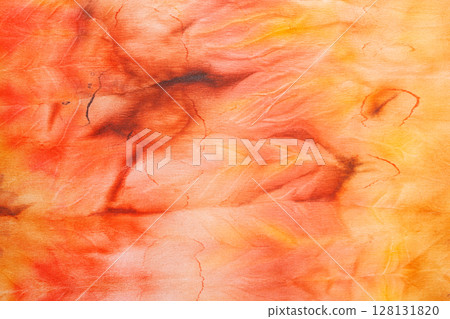 abstract pattern on silk fabric texture in yellow and brown tones abstract pattern on silk fabric texture in yellow and brown tones 128131820