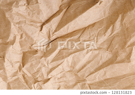 Brown texture kraft paper, recycled cardstock. Old crumpled recycled paper of old crumpled recycled paper 128131823