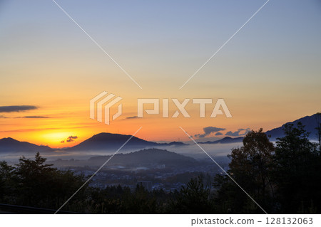 Winter dawn scene in a mountain village 128132063