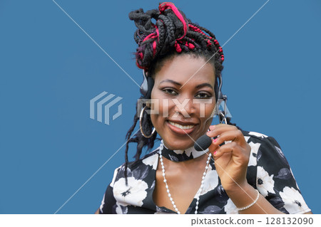 Black Woman Customer Service Representative with Headset Smiling 128132090