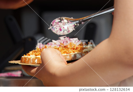 Traditional open-faced sandwich preparation 128132634