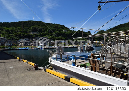 Fishing boat anchored at the fishing port 128132860