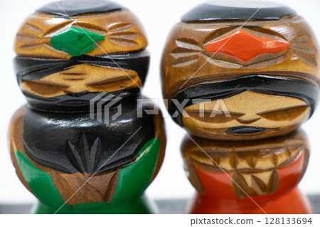 Ainu wooden doll 128133694
