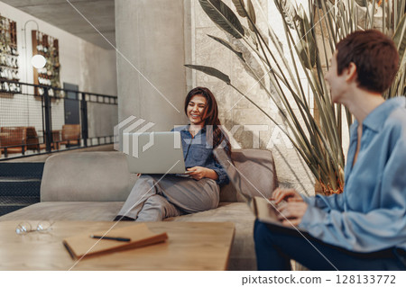 Professionals are engaging in effective collaboration within the modern workspace environment Professionals are engaging in effective collaboration within the modern workspace environment 128133772