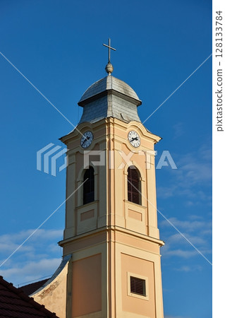 Old church tower renovated Old church tower renovated 128133784
