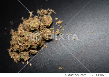 High-quality Cannabis Buds Displayed on a Dark 128134075