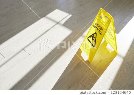Please take extreme caution as you proceed the Wet Floor Sign is visible in bright light 128134640