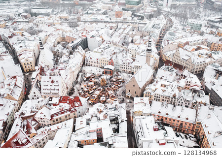 Aerial View of Tallinn with the Town Hall Square in winter, roofs with snow, Christmas mood Aerial View of Tallinn with the Town Hall Square in winter, roofs with snow, Christmas mood 128134968