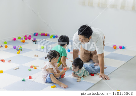 Children playing indoors Children playing indoors 128135868