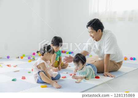 Children playing indoors Children playing indoors 128135869