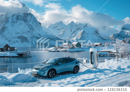 A car is charging at a charging station in the snow 128136310