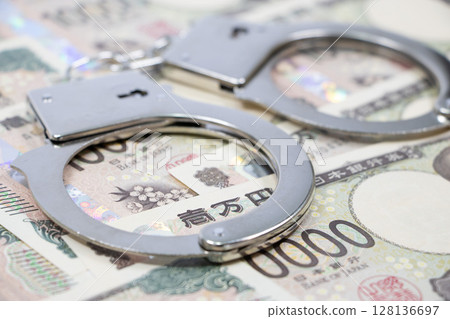Japanese Yen Handcuffs 128136697