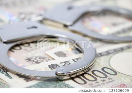 Japanese Yen Handcuffs 128136699