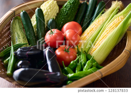 Summer vegetables in a colander Summer vegetables in a colander 128137833