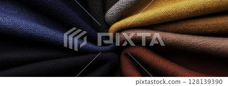Colorful Textile Swatches Displayed in a Beautiful Circular Arrangement of Fabrics Colorful Textile Swatches Displayed in a Beautiful Circular Arrangement of Fabrics 128139390