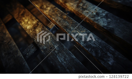 Detailed Close-Up of Wooden Planks with Dramatic Lighting and Textures 128139722