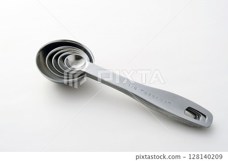 Stainless steel measuring spoons for cooking 128140209