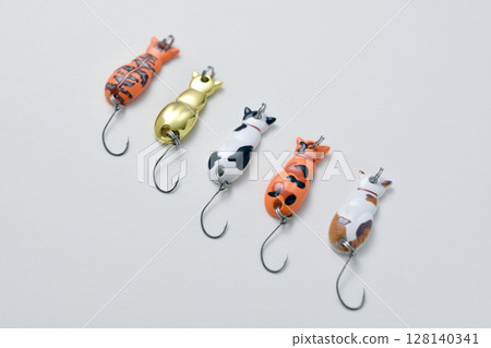 A cute and colorful cat-shaped spoon lure for fishing 128140341