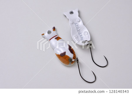 A cute and colorful cat-shaped spoon lure for fishing 128140343