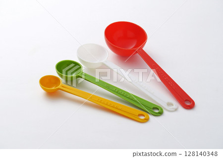 Colorful plastic measuring spoons for cooking spices Colorful plastic measuring spoons for cooking spices 128140348