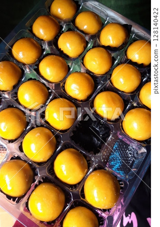Pineapple cake, called Kue Nenas or Nastar in Indonesian, is one of the most popular traditional sweets to celebrate Eid al-Fitr. Indonesian people's favorite sweets. Selective focus. Pineapple cake, called Kue Nenas or Nastar in Indonesian, is one of the most popular traditional sweets to celebrate Eid al-Fitr. Indonesian people's favorite sweets. Selective focus. 128140422