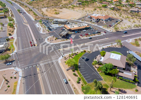 Complex multi lane roadways intersection with commercial buildings, parking lots, landscaped areas in Fountain Hills, Maricopa County, Arizona Complex multi lane roadways intersection with commercial buildings, parking lots, landscaped areas in Fountain Hills, Maricopa County, Arizona 128140691