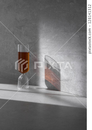 Concrete background that can be used in various designs with shadows of sunlight through the window. Concrete background that can be used in various designs with shadows of sunlight through the window. 128141312