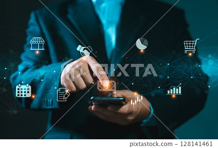 Businessman using a smartphone for control business management and network technology. Network structure and business icons. Business people is working. Businessman using a smartphone for control business management and network technology. Network structure and business icons. Business people is working. 128141461