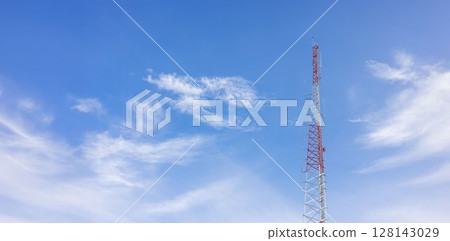Telecommunication tower against blue sky with digital wireless network and futuristic technology interface for 5G, internet, and global data connection concept. communication network. 128143029