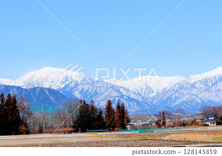 Northern Alps from Shinano Omachi in March Mountains of Shinshu Scenery of Shinshu 128143859