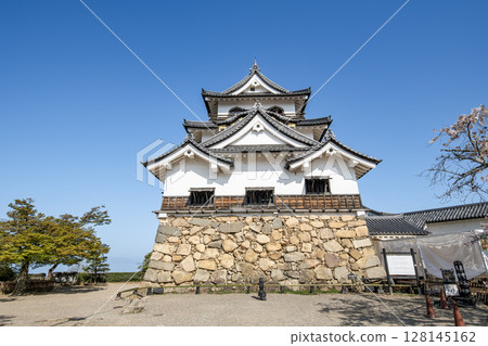 Hikone Castle tower on a clear day in Hikone City, Shiga Prefecture 128145162