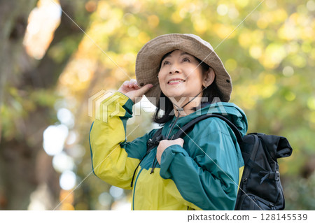Hiking Autumn Yellow leaves 128145539