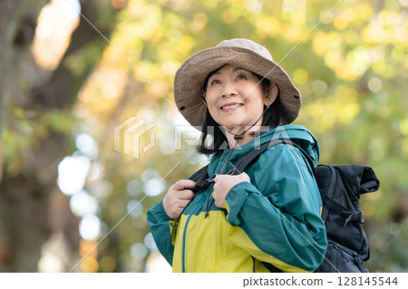 Hiking Autumn Yellow leaves 128145544