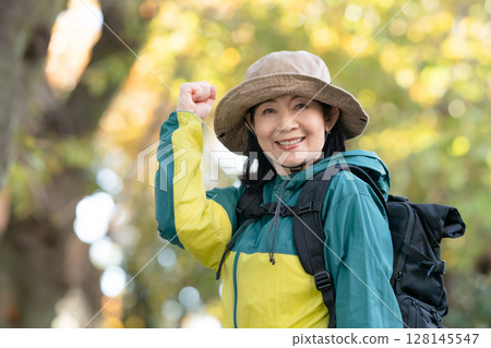 Hiking, Autumn, Yellow leaves, Fist pump Hiking, Autumn, Yellow leaves, Fist pump 128145547