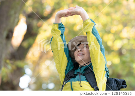 Hiking, Autumn, Yellow leaves, Deep breath, Stretching 128145555