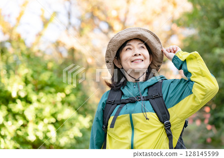 Hiking Autumn Yellow leaves Hiking Autumn Yellow leaves 128145599