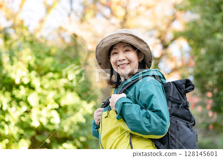 Hiking Autumn Yellow leaves 128145601