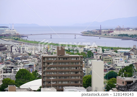 Wakayama Castle, Wakayama City. Minato Bridge (mouth of the Kinokawa River) and Awaji Island in the direction of Shikoku, seen from the main tower (zoomed westward, early summer) 128149143